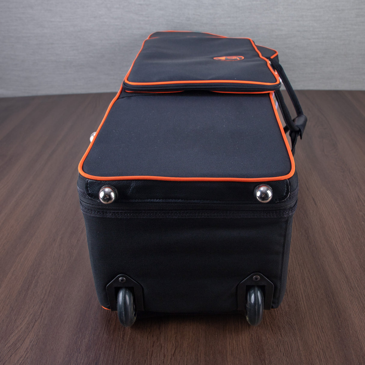 Marcus Bonna Baritone Saxophone Low A Case with Wheels - Black with Orange Trim and Badge