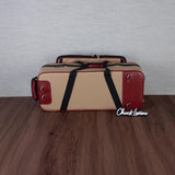 Marcus Bonna Gentleman's Bassoon Case - Beige/Ivory Leather, Wine Red Trim, Silver Metal Logo