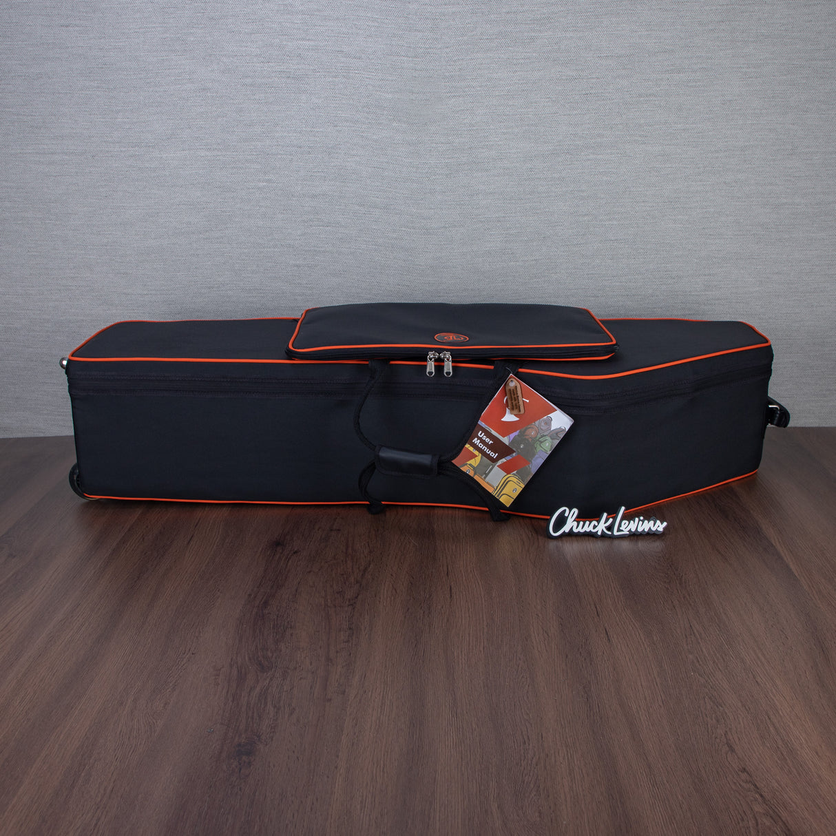 Marcus Bonna Baritone Saxophone Low A Case with Wheels - Black with Orange Trim and Badge