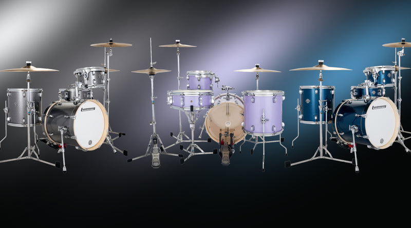 Set of five different colored drum sets on a gradient background