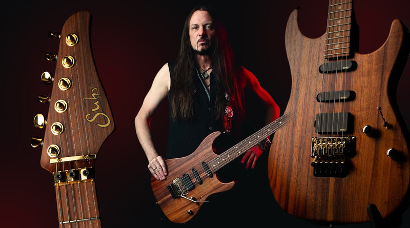 Man holding a guitar with close-up views of guitar heads and body on a dark background
